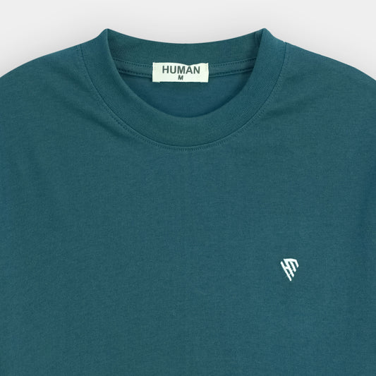 TRANSFORMATIVE TEAL TEE